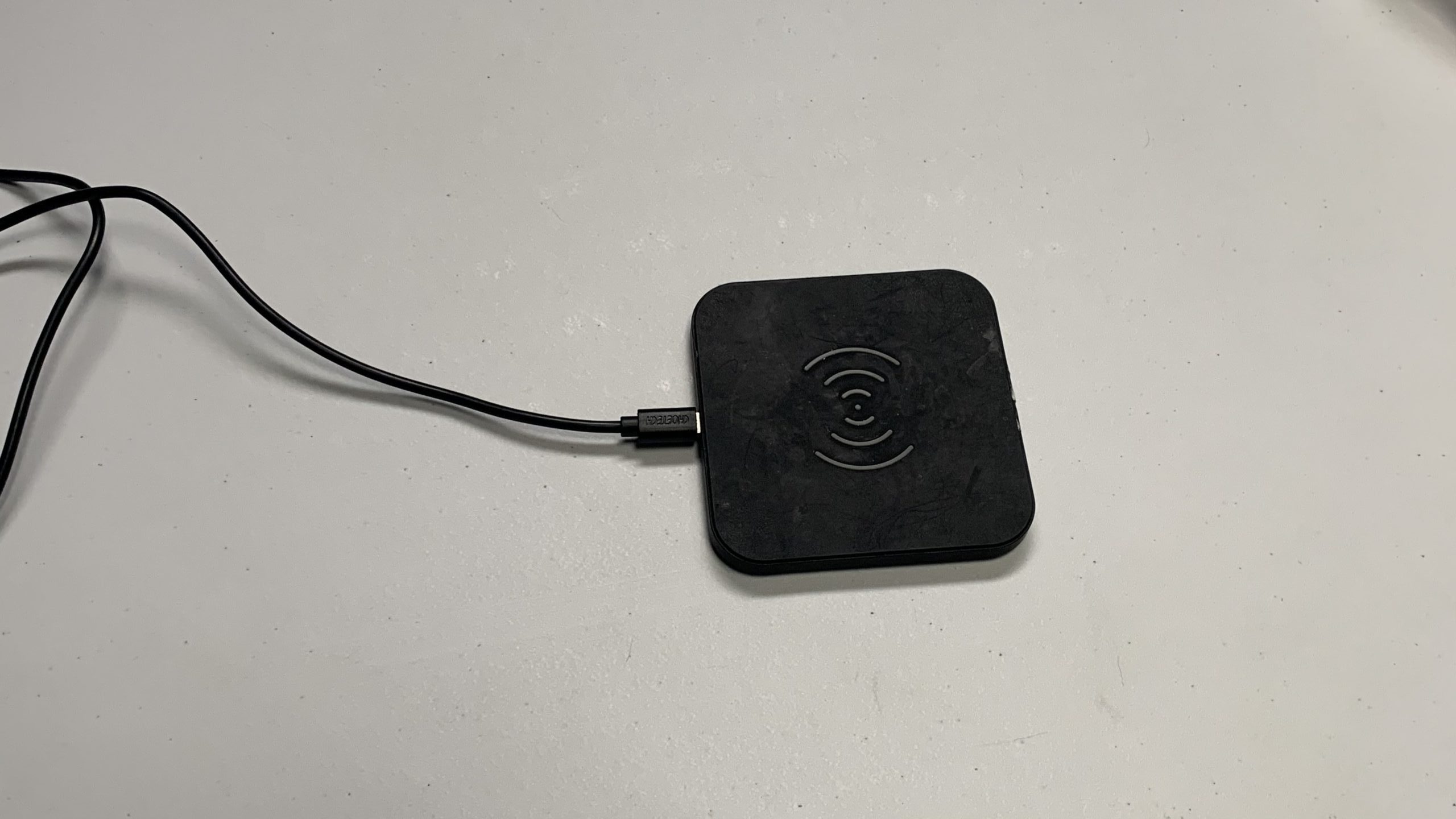 Wireless charger connected to power cable